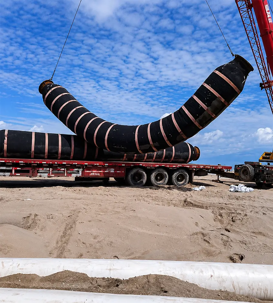 Heavy construction equipment working on a large industrial site